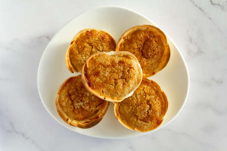 Traditional Portuguese pastry called Queijada de Sintra. Top viewの写真素材