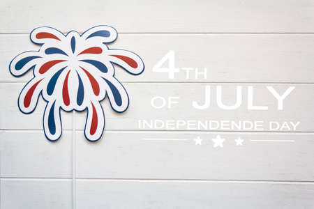 American fireworks on white wooden table with the text 4th of July,Independence dayの写真素材