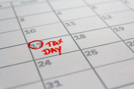 US tax day marked on calendar in May 17 2021 to illustrate the new extended date for IRS Federal Income Tax Returns. USA Tax deadline conceptの写真素材