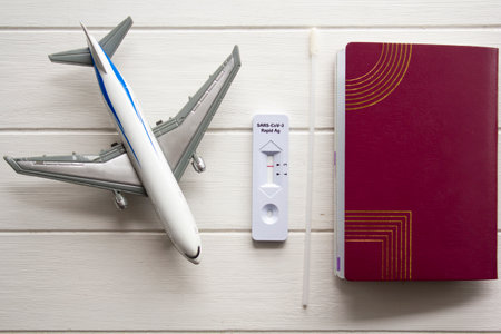 Passport, negative test and airplane. Travel during  pandemic conceptの写真素材