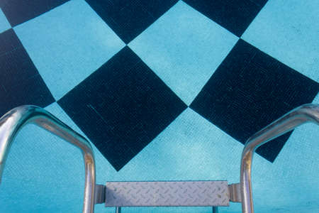 Top view of stairs of Swimming pool with diamond shaped tilesの写真素材