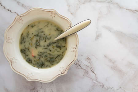 Warm and comforting portuguese soup called caldo verde. top view with copy spaceの写真素材