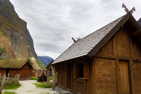 Houses on viking village surrounded by fjord landscapeの写真素材