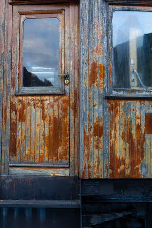 Old wooden train door and windowの写真素材