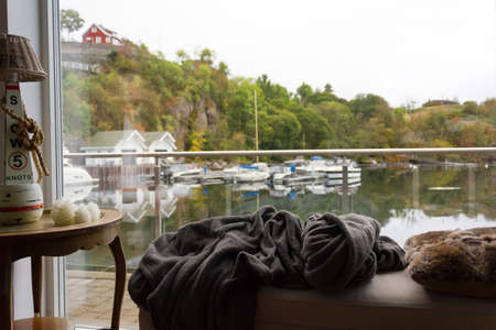 Living room with a beautiful view to the harborの写真素材