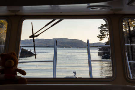 Sailing in a yacht in norway waters. View from inside the yachtの写真素材