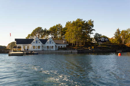 Traditional Norwegian house near the seaの写真素材
