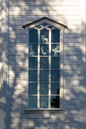Wooden house with beautiful windowの写真素材