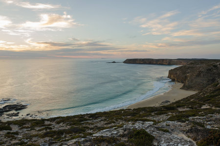 Scenic sea coast bay at sunsetの写真素材