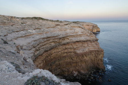 Scenic sea coast bay at sunsetの写真素材