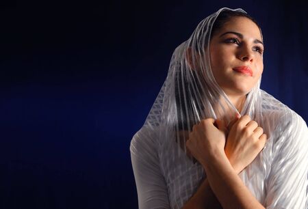 Portrait of young hispanic woman with veilの写真素材