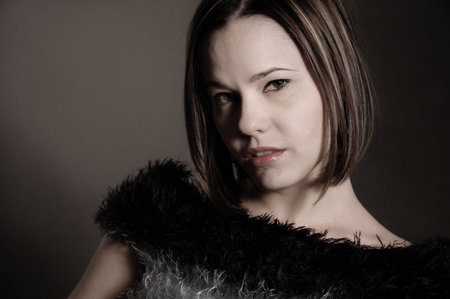 Portrait of young classy female beauty posing