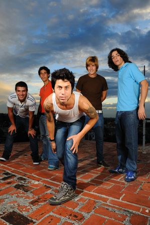 Portrait of young trendy group of friends posing with attitudeの写真素材