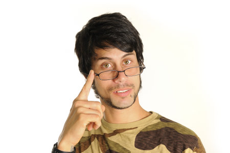 Portrait of a young hispanic man wearing reading glasses - isolated over white