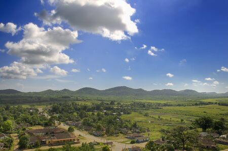 A view of tropical rural landscape with valley and settlement - sierra del escambray, cubaの写真素材