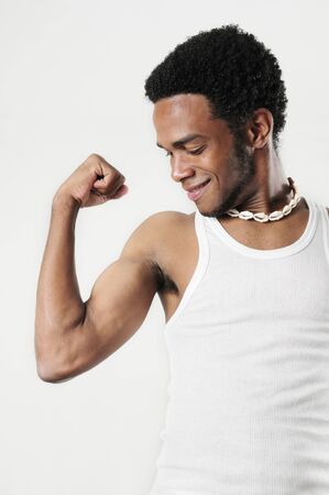 Portrait of young healthy muscular african american man - isolatedの写真素材