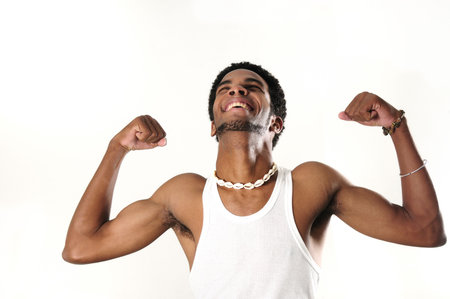 Portrait of young healthy muscular african american man - isolatedの写真素材