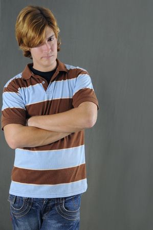 Portrait of casual young man with serious expressionの写真素材