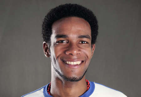 Portrait of young handsome african american man with happy expressionの写真素材