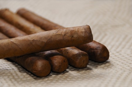 Bunch of typical handmade cuban cigars with soft focusの写真素材