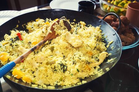 Cuban Paella - traditional rice dish with meat and vegetablesの写真素材