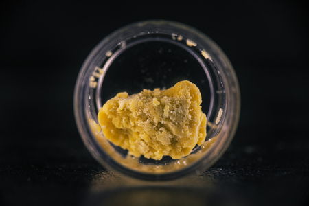 Marijuana extraction concentrate aka wax crumble isolated on black backgroundの写真素材