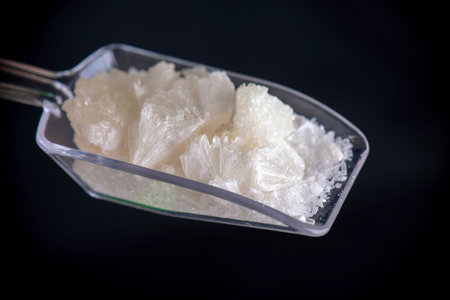 Macro detail of Cannabidiol crystal aka CBD, a pure isolated medical cannabis compound used for its...