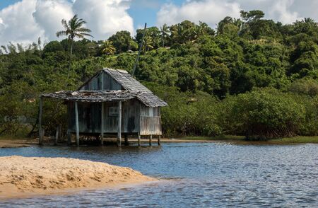 Fisehrman shed over the waterの写真素材