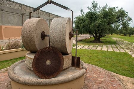 Old grinder wheel for olive oil productionの写真素材