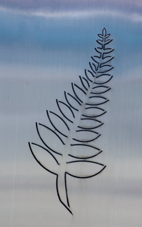 Wondeful shaded coloring in this steel with a fern imprint の写真素材