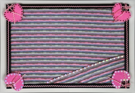 Frame craft work with pink as it's main color and hearts on the corners.の写真素材