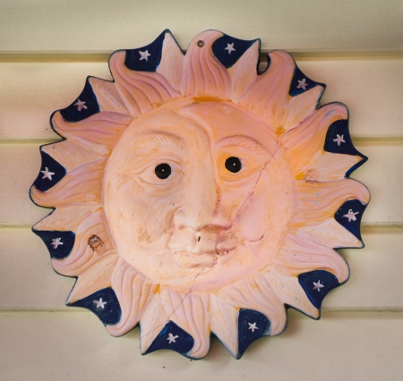 Sunny face with a crack a cross it の写真素材