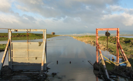 As the flood waters drain down the floodway it is pump out here.の写真素材