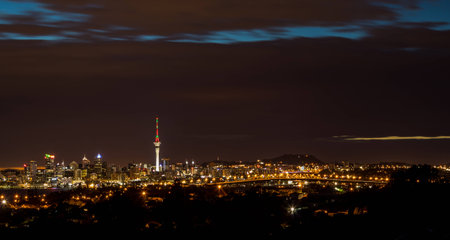 The wonderful city of Auckland a night with the sky tower lights.の写真素材