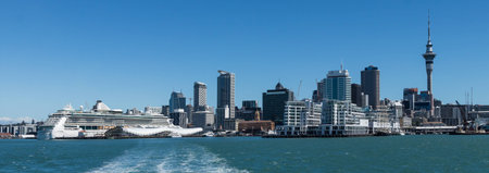 New Zealands largest city with a large ship in port.の写真素材