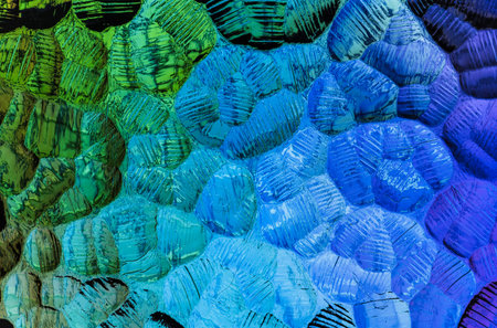 Abstract of pattern glass with a mixture of colors in the pattern.
