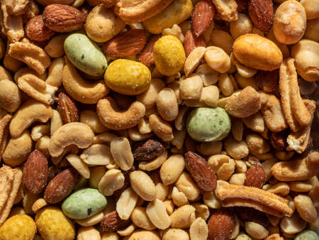 Great mixture of edible nuts, like cashews and peanuts etcの写真素材