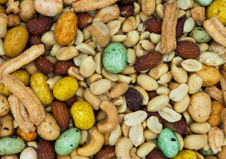 Great mixture of edible nuts, like cashews and peanuts etcの写真素材