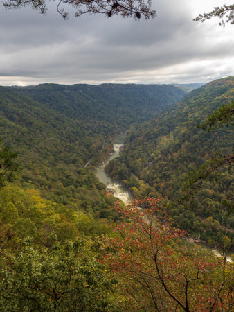 New River Gorge National Park in West Virginia comes alive with vibrant early fall colors,...