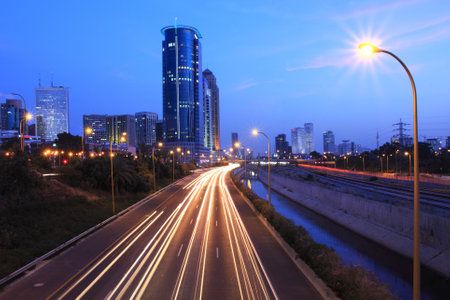 View on Ayalon freeway and modern building at evening in Tel-Aviv, Israel.のeditorial素材