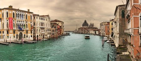 Panoramic view on famous Grand Canal among historic houses in Venice, Italy.の写真素材