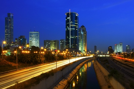 Tel Aviv downtown and Ayalon freeway at night.の写真素材