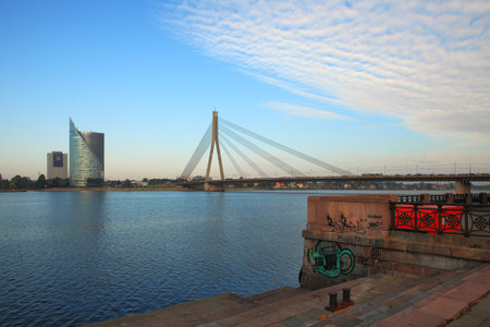 View on modern building and bridge over Daugava River in Riga, Latvia.のeditorial素材