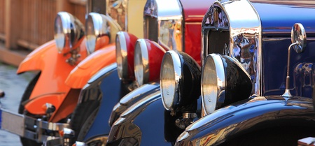 Three old fashioned cars on the street of Prague, Czech Republic の写真素材