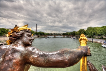 View on Seine river and Eiffel Tower from famous Alexander the III bridge in Paris, France.の写真素材
