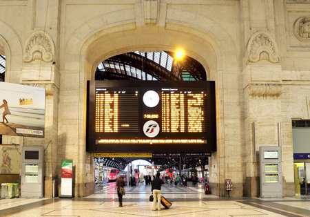 MILAN - JUNE 07: Main timetable at Milan Central Station. Station was opened in 1931, serves national and international routes and is one of the main European railway stations in Milan, Italy on June 07, 2012.のeditorial素材