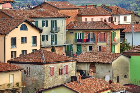 Traditional colorful italian tiled roof houses at town of Diano D'Alba in Piedmont, Northern Italy.の写真素材