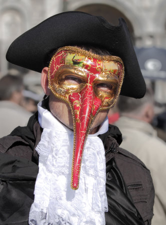 VENICE, ITALY - MARCH 04: Unidentified participant wear traditional mask and costume during famous Venetian Carnival on March 04, 2011 in Venice, Italy.のeditorial素材