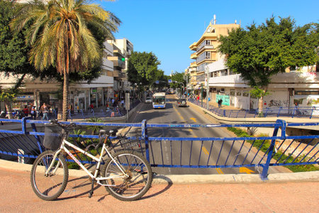 TEL AVIV - JANUARY 29: Bicycle on the bridge over Dizengoff street - major street in central Tel Aviv, named after Tel Avivのeditorial素材