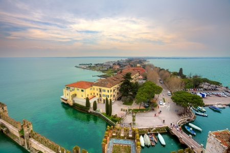 Aerial view from Scaglieri castle on Lake Garda and town of Sirmione in Italy の写真素材